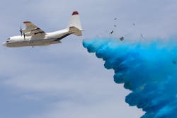 Photo 1. A C-130 with 16 PCADS being deployed in air-drop test at U.S. Army Yuma Proving Grounds. Photo 1. A C-130 with 16 PCADS being deployed in air-drop test at U.S. Army Yuma Proving Grounds.