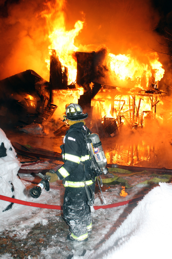A large two and a half story home became fully involved during a three alarm fire in Stow, MA on a freezing January night.