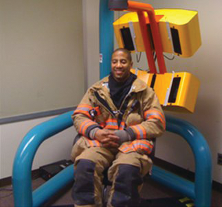 A firefighter is put through a series of tests as part of anthropometric study.