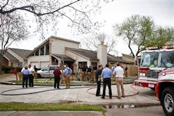 Emergency Personnel respond to the location where a fire broke out at a day care, killing four children and injuring four others.