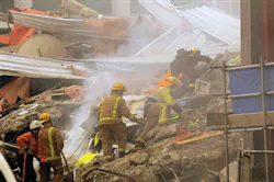 Rescue workers sift through the debris of a collapsed building after an earthquake rocked Christchurch, New Zealand. Rescue workers sift through the debris of a collapsed building after an earthquake rocked Christchurch, New Zealand.