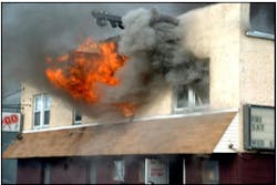 Photo 1. Taxpayers can have mixed occupancies in the same building. This working fire was in the residential section of the structure. Photo 1. Taxpayers can have mixed occupancies in the same building. This working fire was in the residential section of the structure.