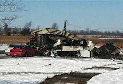 A mobile home is shown after a fire that killed two women and two men. A mobile home is shown after a fire that killed two women and two men.