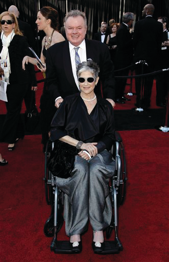 Actor Jack McGee and his wife Stephanie McGee arrive before the 83rd Academy Awards.