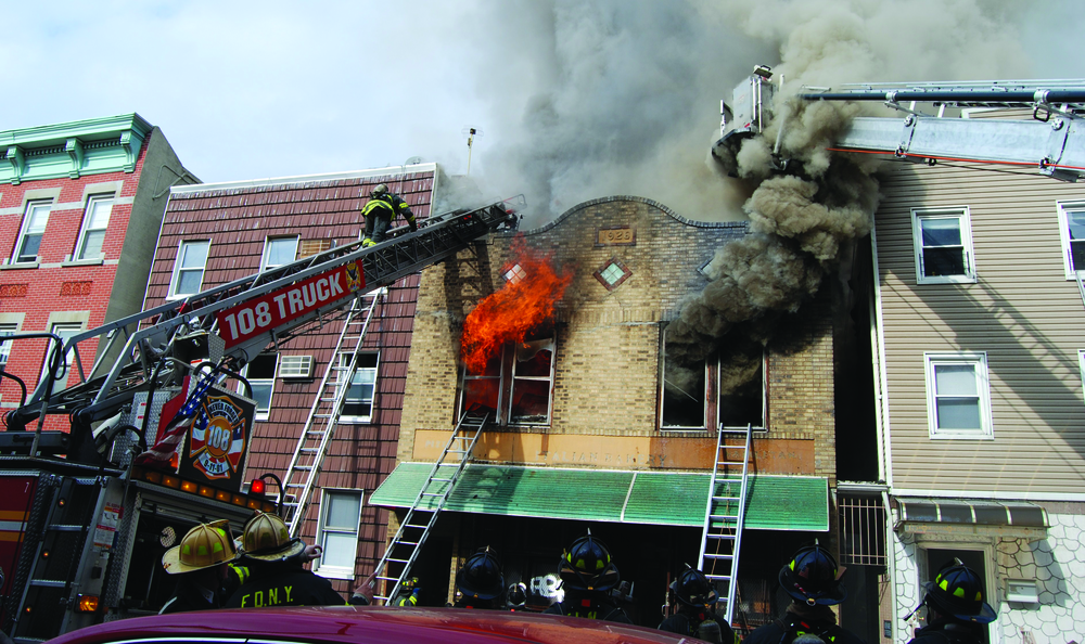 BROOKLYN, NY, FEB. 7, 2011 &ndash; A fire in a two-story brick commercial building spread to exposure two. Four handlines and one tower ladder were used to knock down the heavy fire.