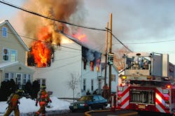 FAIR LAWN, NJ, FEB. 24, 2011 &ndash; A two-family home was destroyed in a two-alarm blaze, leaving four people homeless, including one person in a wheelchair. Units were dispatched shortly before 7 A.M. First-arriving police units confirmed that heavy smoke and fire was visible. All residents safely evacuated the building before the arrival of fire units, but flames had full possession of the second floor and attic. A second alarm was transmitted as exposure lines were put in operation. An interior attack was attempted, but heavy fire and the possibility of collapse made that untenable. Several exterior lines were put into operation as well as an elevated master stream in the rear. After about a one-hour battle, the flames were darkened down and held to the original fire building. The heat had melted the siding on both exposure buildings, but no other damage was reported. The cause is under investigation.