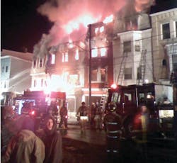 A firefighter had to be rescued from a window and two others were escorted out by a RIT team during a Girardville a blaze that destroyed five row homes on Feb. 23. A firefighter had to be rescued from a window and two others were escorted out by a RIT team during a Girardville a blaze that destroyed five row homes on Feb. 23.