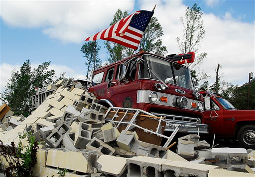 Debris covers a fire truck at the Eoline Volunteer Fire Department near Centreville, Ala.