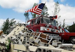 Debris covers a fire truck at the Eoline Volunteer Fire Department near Centreville, Ala. Debris covers a fire truck at the Eoline Volunteer Fire Department near Centreville, Ala.