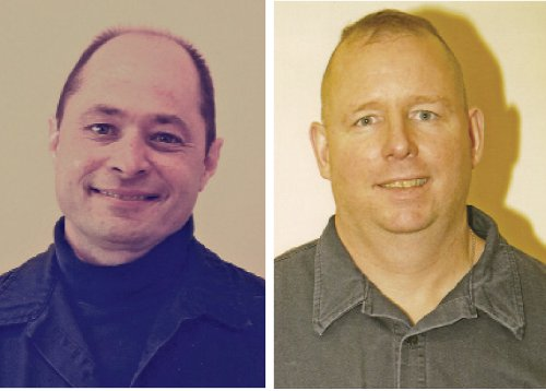 Firefighters Chris Reischl, left, and Robert Mansfield