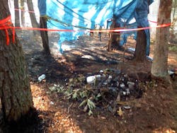 Photo 2. Remains of a campfire. This fire consumed seven acres. Photo 2. Remains of a campfire. This fire consumed seven acres.
