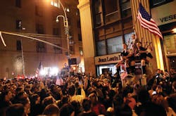 A large, jubilant crowd reacts to the news of Osama Bin Laden's death at the corner of Church and Vesey Streets, adjacent to ground zero. A large, jubilant crowd reacts to the news of Osama Bin Laden's death at the corner of Church and Vesey Streets, adjacent to ground zero.