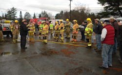 The “cast” is given a briefing during filming of NFPA’s hybrid and electric vehicle video by Rich Dion, left center. The “cast” is given a briefing during filming of NFPA’s hybrid and electric vehicle video by Rich Dion, left center.