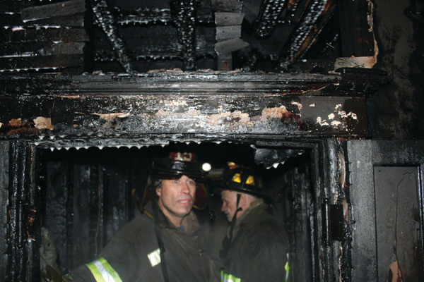 Crews were met with fire as well as heavy smoke throughout the structure.