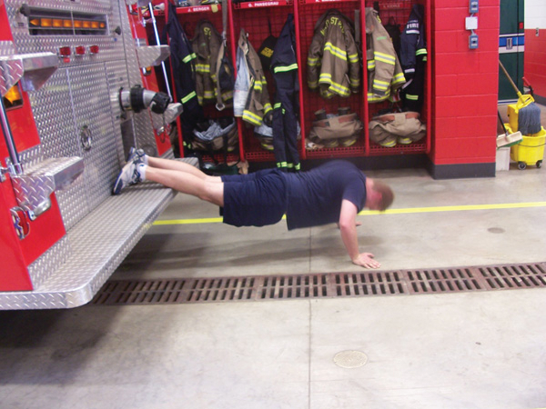 Tailboard push-ups.