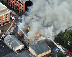 Aerial photo of the fireground taken from the C/D corner shows Citizens Truck Company Truck 41 operating a master stream on the A side and Walkersville Fire Company Quint 11 operating from the B/C corner. Aerial photo of the fireground taken from the C/D corner shows Citizens Truck Company Truck 41 operating a master stream on the A side and Walkersville Fire Company Quint 11 operating from the B/C corner.