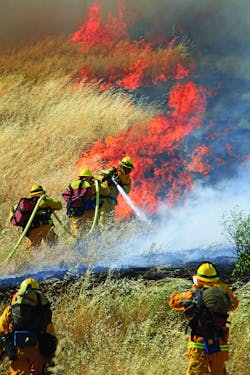 MONTEREY COUNTY, CA, MAY 30, 2011 –The U.S. Forest Service, three air tankers, three helicopters, 10 engines, a dozer and several hand crews attacked a fire that involved 500 acres of grass and brush near homes outside San Ardo. First-arriving units found a downed power line had spread flames into the grass, with 30 acres of fire being pushed by strong winds. Before the afternoon was over, 500 acres were consumed and the incident commander reported the potential for 5,000 acres if the strong winds did not cease. By 6:45 P.M., the 50-mph winds did subside, letting firefighting resources corral the fire. MONTEREY COUNTY, CA, MAY 30, 2011 –The U.S. Forest Service, three air tankers, three helicopters, 10 engines, a dozer and several hand crews attacked a fire that involved 500 acres of grass and brush near homes outside San Ardo. First-arriving units found a downed power line had spread flames into the grass, with 30 acres of fire being pushed by strong winds. Before the afternoon was over, 500 acres were consumed and the incident commander reported the potential for 5,000 acres if the strong winds did not cease. By 6:45 P.M., the 50-mph winds did subside, letting firefighting resources corral the fire.