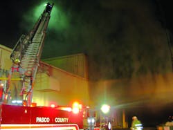 Early in the incident, Engine 32 operates its aerial at the intersection of sides A and B. Early in the incident, Engine 32 operates its aerial at the intersection of sides A and B.