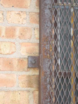 Security bars can look very intimidating, but a firefighter who is properly trained will know otherwise. These devices are connected to the building with lag bolts or with the bars set into the mortar joints. Shearing off the head of the lag bolt with a set of irons or hitting the mortar joints with a sledge a few times will release the devices. We do not want our rapid intervention team members committed to something that will keep them from being available for rescue, but a task like this should not be a major deal that requires a lot of effort for a well-trained crew. Security bars can look very intimidating, but a firefighter who is properly trained will know otherwise. These devices are connected to the building with lag bolts or with the bars set into the mortar joints. Shearing off the head of the lag bolt with a set of irons or hitting the mortar joints with a sledge a few times will release the devices. We do not want our rapid intervention team members committed to something that will keep them from being available for rescue, but a task like this should not be a major deal that requires a lot of effort for a well-trained crew.