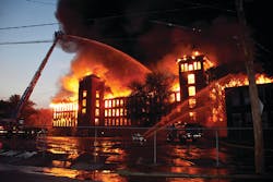 The main building of the complex is now fully involved. The main building of the complex is now fully involved.