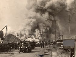 Heavy smoke pours from a seven-alarm fire at Pier 7 in Baltimore, MD, on Oct. 15, 1932.