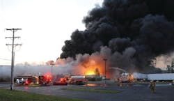 Firefighters work to get water on an industrial fire at Nicos Polymers Group recycling plant in Plainfield Township, Pa. Firefighters work to get water on an industrial fire at Nicos Polymers Group recycling plant in Plainfield Township, Pa.