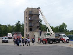 Students at the Monroe County, NY, Public Safety Training Facility (PSTF) receive an initial briefing on heavy rigging lift from course instructors. Students at the Monroe County, NY, Public Safety Training Facility (PSTF) receive an initial briefing on heavy rigging lift from course instructors.