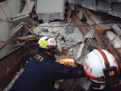 Photo 1. Many steps in advance of this operation are completed before the rescue squads “go to work.” Photo 1. Many steps in advance of this operation are completed before the rescue squads “go to work.”