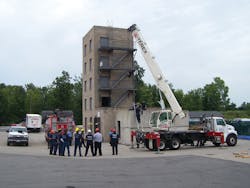 Students at the Monroe County, NY, Public Safety Training Facility (PSTF) receive an initial briefing on heavy rigging lift from course instructors. Students at the Monroe County, NY, Public Safety Training Facility (PSTF) receive an initial briefing on heavy rigging lift from course instructors.