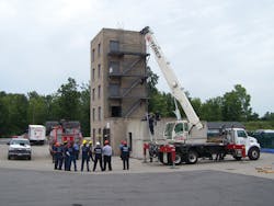 Students at the Monroe County, NY, Public Safety Training Facility (PSTF) receive an initial briefing on heavy rigging lift from course instructors.