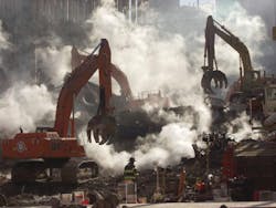 The wreckage of the World Trade Center still smolders on Oct. 10, 2001 as recovery operations continue, nearly a month after the terrorist attack.