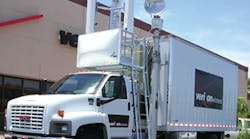 A Verizon Wireless Cell on Light Truck (COLT) that features a cell tower system built into the vehicle.