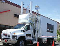 A Verizon Wireless Cell on Light Truck (COLT) that features a cell tower system built into the vehicle.