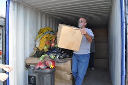 International Fire Relief Mission President Ron Gruening transfers fire-fighting and EMS equipment donated from Wyoming from a 20-foot-long shipping container to a truck for transport back to IFRM&rsquo;s warehouse in Minnesota. This was the largest single donation IFRM has ever received.