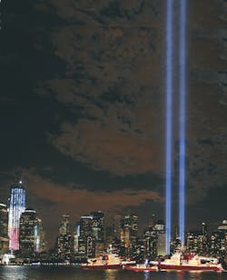 The new 1 World Trade Center, at left of photo, has reached the 80th-floor level. New York City’s three newest fireboats line up in the Hudson River as memorial lights shine skyward in honor of the 10th anniversary of those killed during the 9/11 terror attacks. The new 1 World Trade Center, at left of photo, has reached the 80th-floor level. New York City’s three newest fireboats line up in the Hudson River as memorial lights shine skyward in honor of the 10th anniversary of those killed during the 9/11 terror attacks.