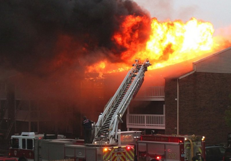 Crews battled a three-alarm fire at an apartment complex in Speedway on Thursday that left dozens of families without homes.