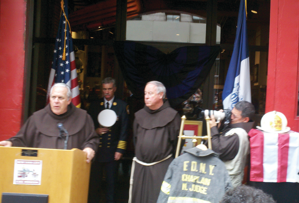 FDNY Chaplain Chris Keenan speaks at the dedication of the bunker coat and helmet of Chaplain Mychal Judge who was killed in 9/11.