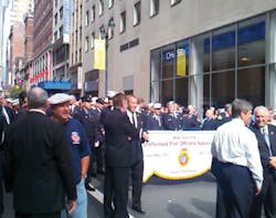 FDNY firefighters prepare to march during the Labor Day Parade.