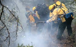 Fire crews dig a fire line on the southern edge of the Pagami Creek Fire, north of Isabella, Minn. Fire crews dig a fire line on the southern edge of the Pagami Creek Fire, north of Isabella, Minn.