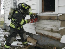 Figure 1. Enlarging windows into doorways is a simple skill that rapid intervention team members must be able to perform.