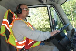 Driver/Operator in vehicle, seated and belted. Vehicle has been properly positioned in a &ldquo;block to the left&rdquo; mode. Parking brake is set. Driver must exit into unprotected traffic situation, zero buffer area.