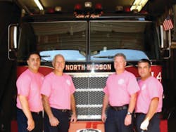North Hudson firefighters have been told they can't be seen in public wearing the pink T-shirts they purchased for Breast Cancer Awareness Month. North Hudson firefighters have been told they can't be seen in public wearing the pink T-shirts they purchased for Breast Cancer Awareness Month.