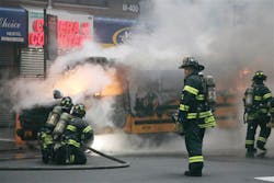 Firefighters hose down a burning school bus in midtown Manhattan in New York , Tuesday, Nov. 22, 2011. Police blocked off the busy area around 7th Avenue and 35th Street for about a half-hour before reopening it. The Fire Department said there were no injuries. Firefighters hose down a burning school bus in midtown Manhattan in New York , Tuesday, Nov. 22, 2011. Police blocked off the busy area around 7th Avenue and 35th Street for about a half-hour before reopening it. The Fire Department said there were no injuries.