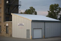 The new technical rescue building features an extended roof designed to accommodate void-search and confined-space simulators. The new technical rescue building features an extended roof designed to accommodate void-search and confined-space simulators.