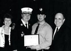Chief Donald J. Burns (second from left) at his son Patrick’s induction ceremony, with his wife, Elizabeth, and former New York City Mayor Rudy Giuliani. Chief Donald J. Burns (second from left) at his son Patrick’s induction ceremony, with his wife, Elizabeth, and former New York City Mayor Rudy Giuliani.