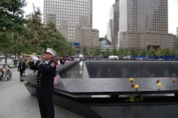 An FDNY firefighter is seen playing the trumpet next to the World Trade Center Memorial on Sept. 11, 2011. An FDNY firefighter is seen playing the trumpet next to the World Trade Center Memorial on Sept. 11, 2011.