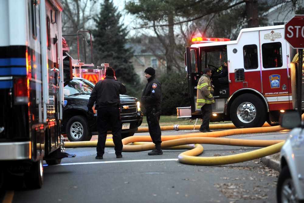 Crews remain on the scene in Stamford, Conn. at a house fire where five died Christmas morning.