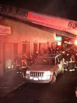 Boston firefighters battled the two-alarm blaze for three to four hours. Boston firefighters battled the two-alarm blaze for three to four hours.