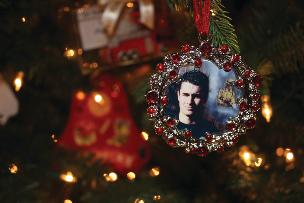 Photographs with heartfelt messages adorn two trees in the National Fallen Firefighters Memorial Chapel.