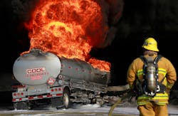 Los Angeles County firefighters battle to put foam on a gasoline tanker which caught fire and burned on the eastbound 60 freeway in Montebello. Los Angeles County firefighters battle to put foam on a gasoline tanker which caught fire and burned on the eastbound 60 freeway in Montebello.
